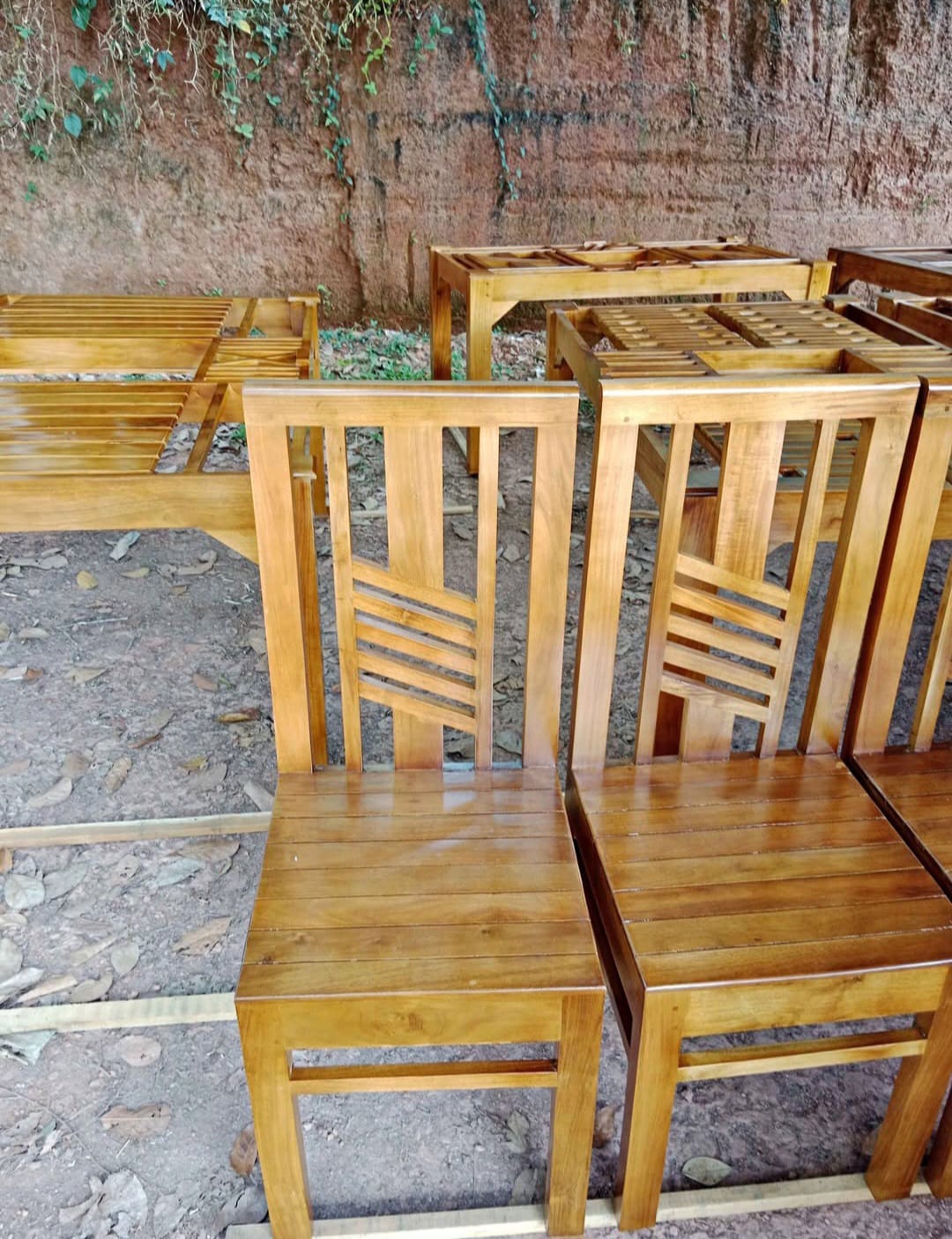 Original photograph of classic wooden chairs beside furniture frames